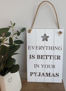 'Everything is better in your pyjamas" sign